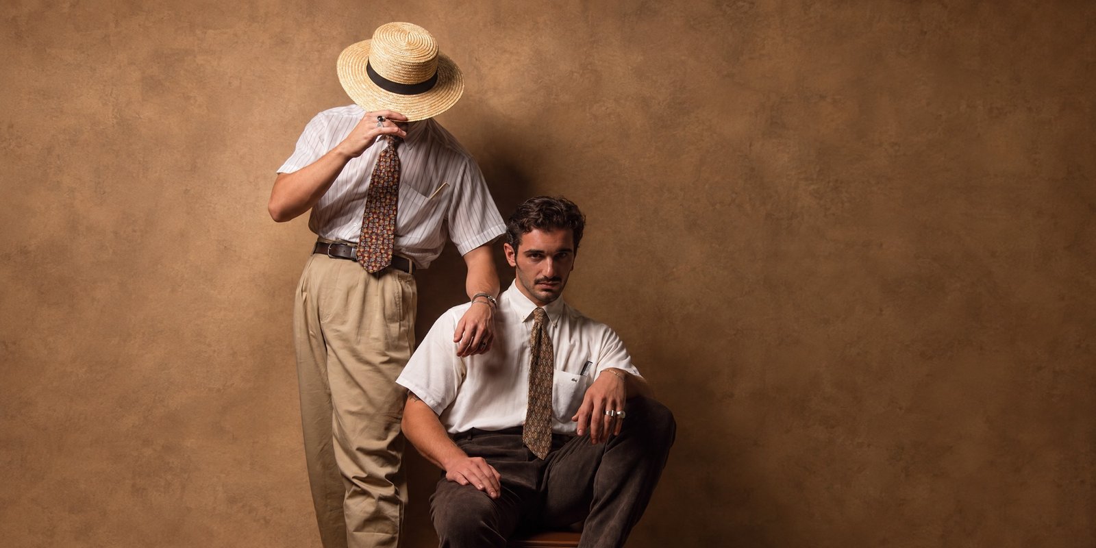 Great Reverie - two men in vintage shirts and ties against a warm brown backdrop