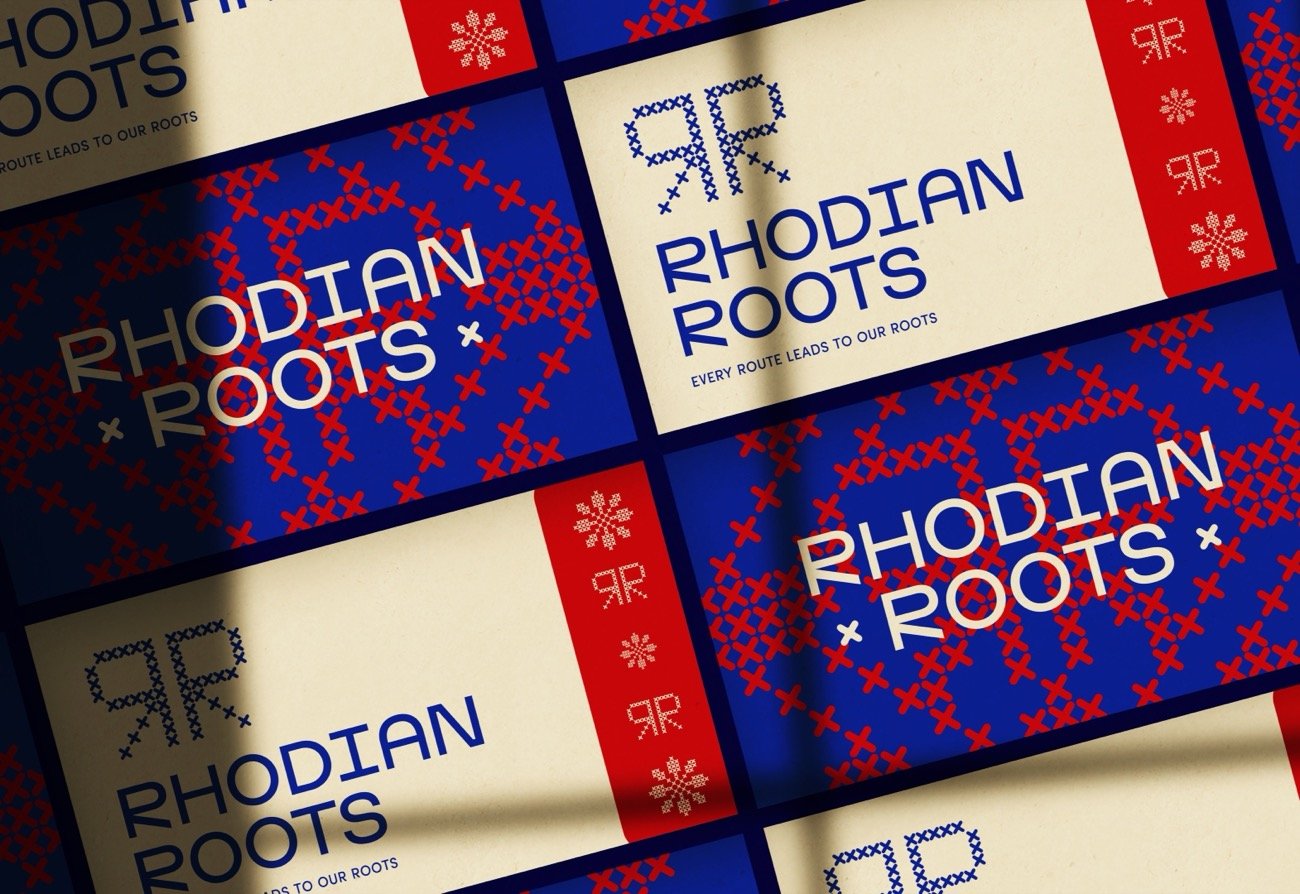Rhodian Roots business cards with the cross-stitch pattern